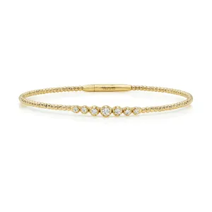 Graduated Diamonds & Gold Bead Flexible Bangle